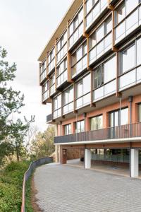 a building with a walkway in front of it at Parador de Soria in Soria