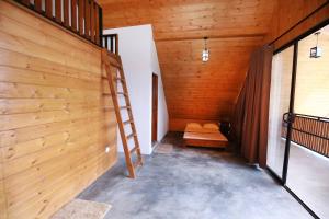 Postel nebo postele na pokoji v ubytování Shalom Bungalow