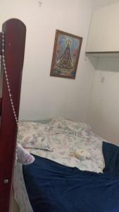 Postel nebo postele na pokoji v ubytování Hospedagem Deus Conosco