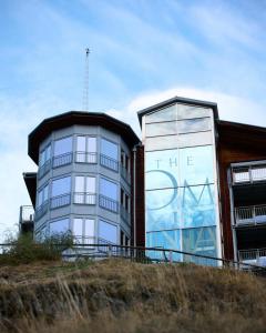 a building with a sign on the side of it at The Omnia in Zermatt