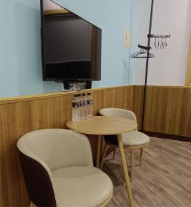 TV a/nebo společenská místnost v ubytování Kanalung Yurakucho House