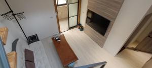TV a/nebo společenská místnost v ubytování Kanalung Yurakucho House