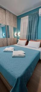 เตียงในห้องที่ Guesthouse Eirini Porto Germeno