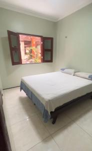 En eller flere senge i et værelse på Chalé Esmeralda - Serra de Guaramiranga