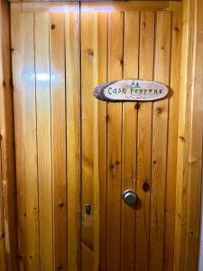 ペスカッセーロリにあるCasa Pepponeの木造壁
