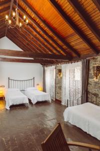Postel nebo postele na pokoji v ubytování EcoVerode Hotel Emblemático Vegetariano Vegano