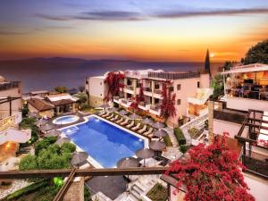 an aerial view of a resort with a swimming pool at Olympion Sunset Halkidiki in Fourka