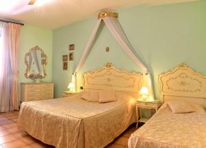 Ένα ή περισσότερα κρεβάτια σε δωμάτιο στο La Terrazza Di Montepulciano