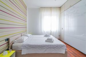 Voodi või voodid majutusasutuse Casa Marconi - Pavia City - by Host4U toas
