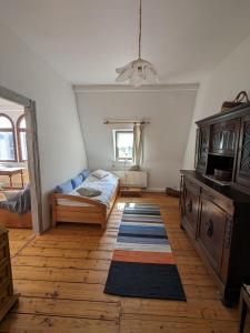 Ένα ή περισσότερα κρεβάτια σε δωμάτιο στο Apartment-Mansardwohnung