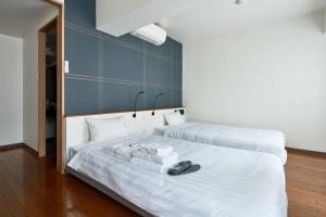 Postel nebo postele na pokoji v ubytování TOKIO's HOTEL