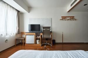 TV a/nebo společenská místnost v ubytování TOKIO's HOTEL
