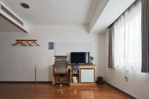 TV a/nebo společenská místnost v ubytování TOKIO's HOTEL