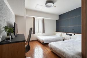 Postel nebo postele na pokoji v ubytování TOKIO's HOTEL