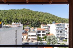 a view from a window of a city at Luxury Central Apartment in Xanthi