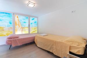 Ένα ή περισσότερα κρεβάτια σε δωμάτιο στο Water Run +19 φωτογραφίες