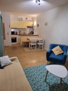 Kuchyňa alebo kuchynka v ubytovaní Résidence la Foret au plus près des pistes. 36m²
