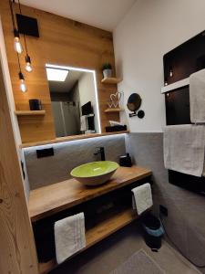 A kitchen or kitchenette at DaHome Appartements