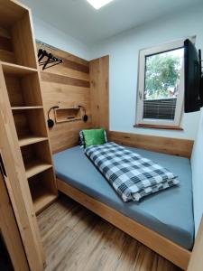 A bed or beds in a room at DaHome Appartements