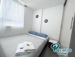 Cama o camas de una habitación en Apartamento Cerca a Expofuturo Por Parceros Group