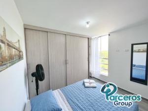 Cama o camas de una habitación en Apartamento Cerca a Expofuturo Por Parceros Group