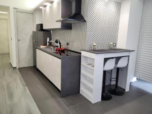 Kuchyň nebo kuchyňský kout v ubytování SP Rooms