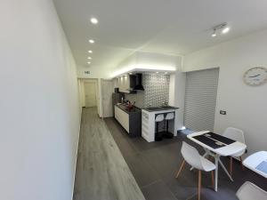 Kuchyň nebo kuchyňský kout v ubytování SP Rooms