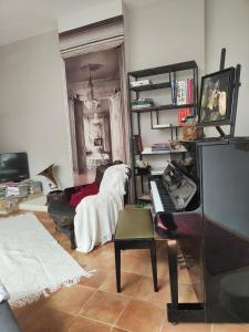 TV a/nebo společenská místnost v ubytování La Belle Epoque près de Nimes et Uzes