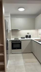 Dapur atau dapur kecil di Oculus Kolonaki Apt