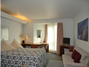 Postel nebo postele na pokoji v ubytování Hotel Corsten + 193 fotografií