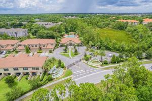 an aerial view of a campus with a building at 3BD Townhouse , Themed , 10 min to Disney , Gated in Kissimmee