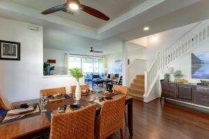 a dining room with a table and chairs at Hale Terra 3br 2ba Beautiful Nihilani Condo, Central AC, Pool, Hot Tub in Princeville