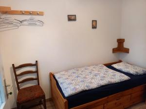 Postel nebo postele na pokoji v ubytování Szilva Apartman