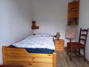 Postel nebo postele na pokoji v ubytování Szilva Apartman