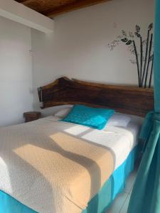 Letto o letti in una camera di Hotel Nantu Hostería