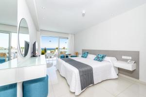 Cama ou camas em um quarto em River Rock Hotel