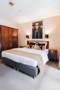 Postel nebo postele na pokoji v ubytování Turnhout City Hotel