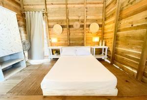 Postel nebo postele na pokoji v ubytování Eco Del Mar