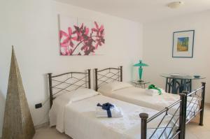 Postel nebo postele na pokoji v ubytování B&B Le Fresie