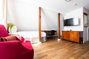 TV a/nebo společenská místnost v ubytování CityHotel Feuerbach