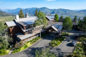 an aerial view of a home with solar panels on its roof at Sun Mountain Lodge in Winthrop