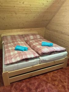 Postel nebo postele na pokoji v ubytování Chalupa Nella