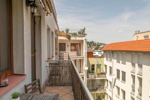 a balcony with a view of a building at Castle View Apartment in Bratislava