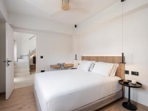 Posteľ alebo postele v izbe v ubytovaní Iperion Beach Hotel