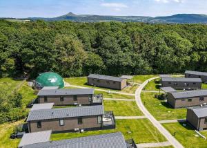 an aerial view of a farm with buildings at Angrove Country Park in Stokesley