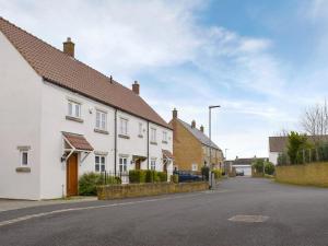 a row of white houses on a street at Hollies Cottage 11 - Ukc4534 in Martock