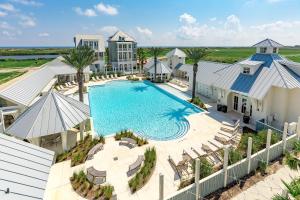 an aerial view of the pool at the resort at Golf Course Living at Palmilla Beach in Port Aransas