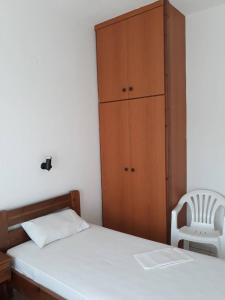 Postel nebo postele na pokoji v ubytování ΠΗΛΙΟΣ ΦΩΤΙΟΣ