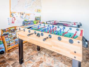 a billiards table with a rack of games at Rivendell Glamping Pod - Uk11881 in North Tamerton