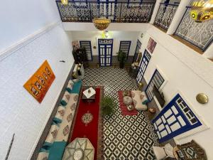 an overhead view of a living room with a couch at Riad Mama Toutou in Marrakech